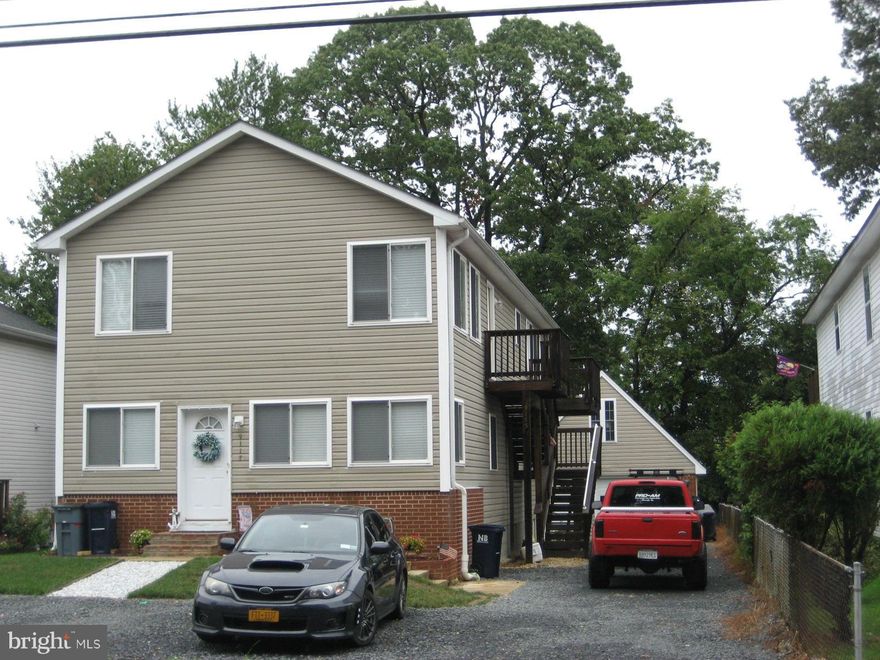 JAN. RENT SPECIAL $500 OFF 1ST MONTHS RENT. Recently renovated upper level duplex apartment.  Master BR has full bath and walk in closet.  Spacious open floor plan.  Convenient to North Beach waterfront and boardwalk.  Updated kitchen with hardwood floors.  Detached garage and lawn care included in rent.  Enjoy upper level deck with bay view.  Avail. Jan 1st. (Must move in Jan 15 to get discount)