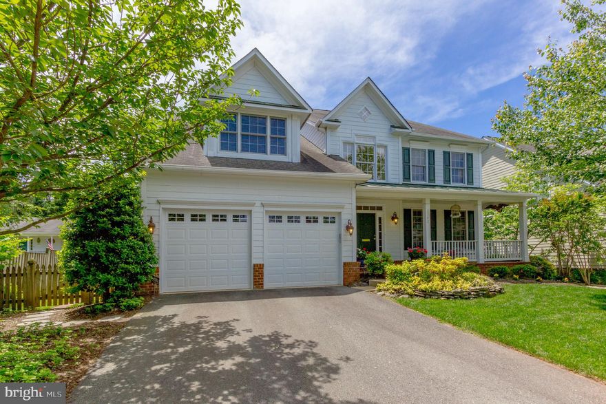 Fabulous NORTH Arlington LOCATION is walking distance to Duck Donuts/Harris Teeter/Starbucks, etc at Lee Harrison Shops. Walk to playtime at Chestnut Hill Park and Nottingham Elementary. Long walk to East Falls Church Metro, at just over a mile. STATELY newer Colonial offers open and sun-filled home. MAIN LEVEL features Two-Story Entry Foyer with Dramatic Staircase and Wainscoting. 9-Foot Ceilings and Hardwood Floors throughout the Main Level. Elegant Living Room offers 3-piece Crown Moulding and Gas Fireplace with Marble and Wood Surround. Banquet-size Formal Dining Room has 3-piece Dentil Crown Moulding, Wainscoting and Chair Rail and Bay Window The Kitchen will delight the Chef! 42" Raised Panel Cherry Cabinets with Many Extras, Granite Counters, Jenn-Air Stainless Steel Appliances and an Oversized Island with Gas Cooktop. Kitchen opens to Breakfast Room with Walls of Windows. And, both are open to an Inviting Family Room offering a Gas Fireplace with Marble and Wood Surround. A Private Library with Built-in Bookcases and Cabinets offers a quiet place for work or reading. Completing the MAIN LEVEL are a stylish Dual-Entry Powder Room and Coat Closet and a Laundry Room with Laundry Tub and Kenmore Elite HD Washer/Dryer. The UPPER LEVEL also has Hardwood Floors and features a dazzling Master Retreat!!! Huge Bedroom Suite with Sitting Area, Walk-in Closet built for TWO and Extra Storage in Dormers. The Spa-like Bath offers Jetted Tub, Glassed-in Shower and Dual Tall Vanities. Jack and Jill Bedrooms have Walk-in Closets and Shared Bath with Dual Vanities. The fourth Bedroom is Ensuite with Walk-in Closet. LOWER LEVEL features a Wide Hallway and 12x24 tile floor that is even heated! Endless Options for Main Rec Room with additional Storage/Pantry room. The Guest Suite has another of those Walk-in Closets. A full Bath with Tub and Utility Room with Storage Area complete the LOWER LEVEL. The EXTERIOR features professionally Landscaped front and back yards. In the front is a Covered, Brick Front Porch and Two-Car Garage. Large Brick Patio with Retractable Awning, level back yard and both grassy and landscaped area make the back an outdoor paradise. Also, there are wide, walk-up stairs from LOWER LEVEL. Accent Lighting and In-ground Sprinkler System are in both the front and back. ADDITIONAL Features of the house include: Two-Zone Gas Heating & Electric Air Conditioning; Whole house Generator and surge protector; Extensive Recessed Lighting; Japanese-made Toilets in Upper Level Bedrooms; Alarm System. This lovely home feeds in the Top Arlington County Schools of Nottingham Elementary, Williamsburg Middle & Yorktown High.