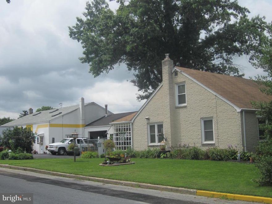 Perfect business and home opportunity! 2700 Sq. Ft. Garage/office with 3 lifts and all auto state inspection equipment plus a 4 bedroom, 2 bath single 1.5 story home with gas heat & central air.