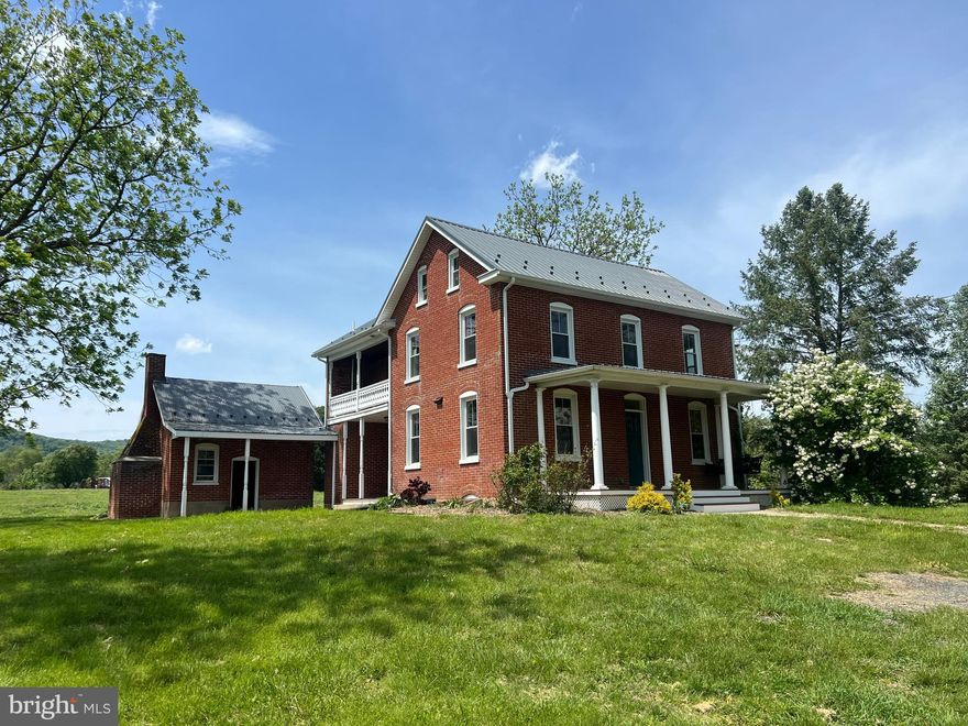 Amazing unique home set on 3 acres. Country setting, Long Lane away from the road. The home features 3 Bedrooms and 2-1/2 baths. All updated with all new electric, plumbing, Windows, Baths and Kitchen. Beautifull finished wood floors. Upper and lower level Heat pumps. There is also cool little summer kitchen with large fireplace for cooking. The home and Summer kitchen both have worry free metal roofs. Well has been added to replace the old cistern. Great oversize paver patio, 3 covered porches. View of  Fairview mountain. Only a short drive to Whitetail Ski Resort and Pristine Whitetail Golf Course This is a must see to appreciate the charm and location. Would also make a great Airbnb. More photos coming in a few days.