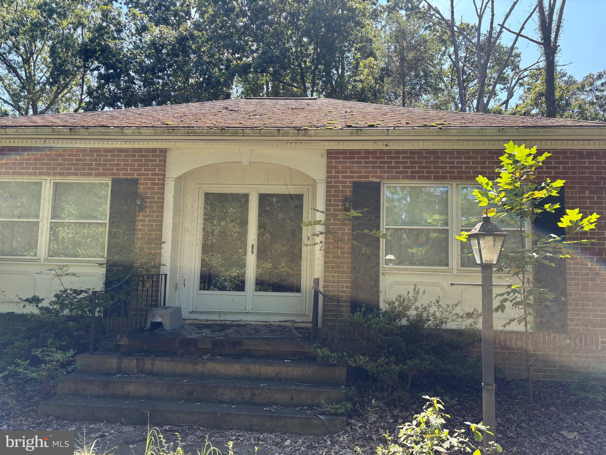 Tucked away in Bryantown, this spacious 3-bedroom, 2-bath rambler offers excellent potential. The home features a large kitchen, formal living and dining rooms, and a mud room with ample storage. The primary suite includes a private full bath and walk-in closet. A detached 2-car garage with workshop space is perfect for projects or additional storage. While the home and yard need some updating, the generous layout and functional floor plan provide a great opportunity for customization. Ideal for buyers seeking a peaceful setting and a property they can make their own.