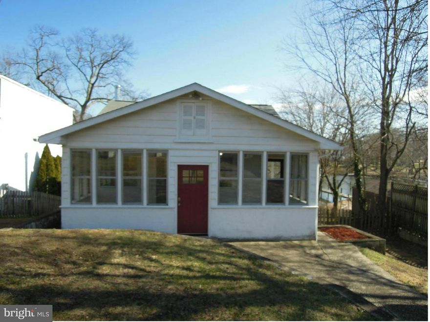Adorable 1940's waterfront cottage at an affordable price! Tucked at the end of a quiet cul-de-sac, peace and tranquility abound !Wake up water side in the master bedroom or have breakfast on your  pier... lower level has full bedroom, bathroom and wood stove -your guests may never leave! The yard is perfect for entertaining , so bring on the spring bbq's and boating!