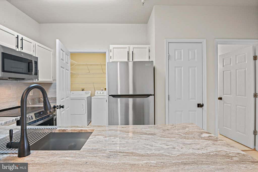 Photo of 1580 Spring Gate Drive #4312, MCLEAN, VA 22102 (MLS # VAFX2330534)