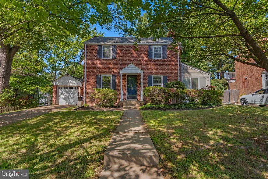Nestled on a serene, tree-lined street, this beautifully maintained 3-bedroom, 2-bath home offers the perfect blend of comfort, space, and functionality. Featuring hardwood floors throughout and abundant natural light, the home welcomes you with a bright living room highlighted by a charming fireplace.

The main level offers flexible living space, including a versatile den or office area with vaulted ceilings, ideal for working from home, a playroom, or additional lounge space. The kitchen provides ample storage and opens to a generous dining area, creating an easy flow for everyday living and entertaining. Just off the main level, a large rear deck overlooks the fully fenced backyard, making it perfect for gatherings, outdoor dining, or relaxing evenings.

Upstairs, you’ll find three well-sized bedrooms and a full bath. The lower level adds even more living potential with a finished bonus room, a private full bathroom, and a separate laundry area, ideal for guests, recreation, or additional workspace.

Outside, enjoy a beautifully landscaped front yard, a deep and private backyard, and a detached one-car garage plus additional off-street parking. Located in the quaint Parkwood neighborhood near trails, parks, and everyday conveniences, this home offers a wonderful balance of charm, updates, and natural surroundings.