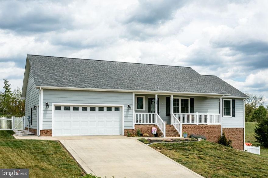 Welcome to the quaint town of Broadway and this lovely ranch with a split bedroom plan and spacious open great room with vaulted ceiling and cozy electric fireplace! The kitchen offers lots of cabinet and counter space, pantry, seating at the breakfast bar and dining area for 8 leading out to the rear deck. Great space for family gatherings and entertaining. There are 2 generous size bedrooms and full bath on the east side of the home. The owner’s suite with full bath, walk-in closet on the west side of the home! The laundry is shared with a half bath conveniently located off the great room. Enjoy mornings on the rear deck and evenings on the covered front porch to watch the sun set. Quiet neighborhood backing up to farmland for that rural feeling, yet convenient to Broadway’s amenities including parks with festivals and pool, schools, shops, dining, farmer’s market, the Linville Creek and near the North Fork of the Shenandoah River. 5-Minutes from Walmart & Food Lion. Within 5 miles of I-81 and the Route 11 Corridor to Harrisonburg.