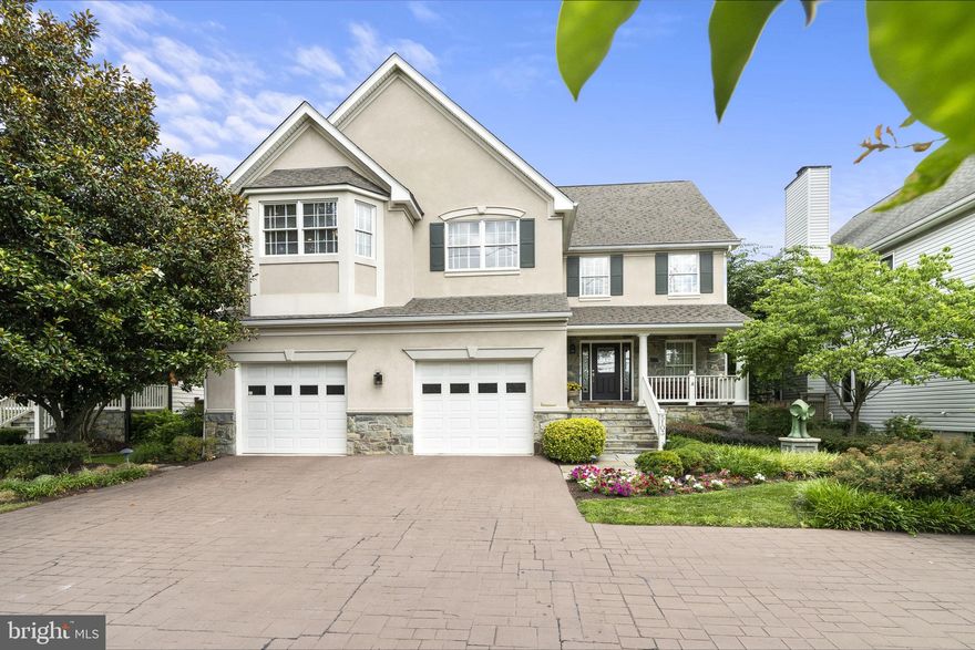 Stunning luxury home nestled in the heart of Bethesda, just 0.3m from the vibrant Downtown Bethesda. 
Thoughtfully remodeled in 2011, this home offers modern functionality and aesthetics, with an inviting front porch and landscaped yard that sets the stage for what lies within. Step inside and be greeted by a spacious and bright main level boasting an open floor plan and lofty high ceilings, creating a sense of airiness, and quiet as a mouse inside. The foyer leads you into a spacious living room with a cozy gas fireplace. Adjacent to the living room is a stylish dining area, adorned with beautiful mahogany floors on the main level. The sliding doors lead you to the expansive screened porch, an idyllic spot for savoring your morning coffee, enjoying happy hour with friends, or indulging in a delightful al fresco dining experience. Prepare to unleash your culinary skills in the stunning high-end kitchen, thoughtfully designed to meet the needs of even the most discerning chefs. An extra-large island takes center stage, surrounded by a suite of top-of-the-line stainless steel appliances, including a Wolf gas cooktop with a retractable exhaust fan, a hidden butler's pantry for effortless organization, a Miele Nespresso machine for your coffee cravings, 3 dishwasher drawers for seamless cleanup, 2 Wolf built-in ovens, a Subzero fridge, a built-in microwave, and exquisite soft-close cabinets, backsplash, and granite countertops that exemplify luxury. The convenient and functional mudroom leads to the oversized 2-car garage, with ample storage space and a Leviton EV charger, while 14-foot ceilings provide an abundance of vertical space. 
Venture upstairs to discover four bedrooms, each with its own bathroom. The light-filled primary bedroom features an oversized walk-in closet with built-ins and an island for your convenience. The ensuite bathroom is a private retreat, adorned with a dual sink vanity, water closet with a bidet, a separate steam shower, and a luxurious soaking tub for the ultimate indulgence. Need extra storage? The finished attic offers the perfect solution, ensuring that every belonging has its place.
The lower level presents an opportunity for endless entertainment- a spacious rec room, complete with a wet bar, a full bathroom and a versatile 5th bedroom/den, currently utilized as a workout room, provide ample space for guests or personal hobbies. The laundry room is equipped with a laundry chute, built-ins and storage. Updates throughout incl. HVAC '18, 2 zoned. 
The low maintenance private backyard is perfect to unwind in the hot tub or fire up the grill for a delightful barbecue on the patio. There is plenty of parking with the large improved driveway, offering ample space for additional vehicles besides the street parking and garage. Situated in a prime location, mere steps away from the bustling Bethesda Row, you'll find an abundance of fabulous dining options, enticing retail experiences, multiple grocery stores, farmers market, and a variety of pilates, yoga, and fitness centers to cater to your active lifestyle. Entertainment options abound, ensuring that you'll always have something exciting to explore. Only 0.7 mile to the Bethesda Metro stop, quick stroll to multiple parks (including Norwood park and playground), Bethesda pool, Capital crescent trail, 0.6m to Bethesda ES, 0.9m to BCC HS. Discover the epitome of refined living in the heart of Bethesda.