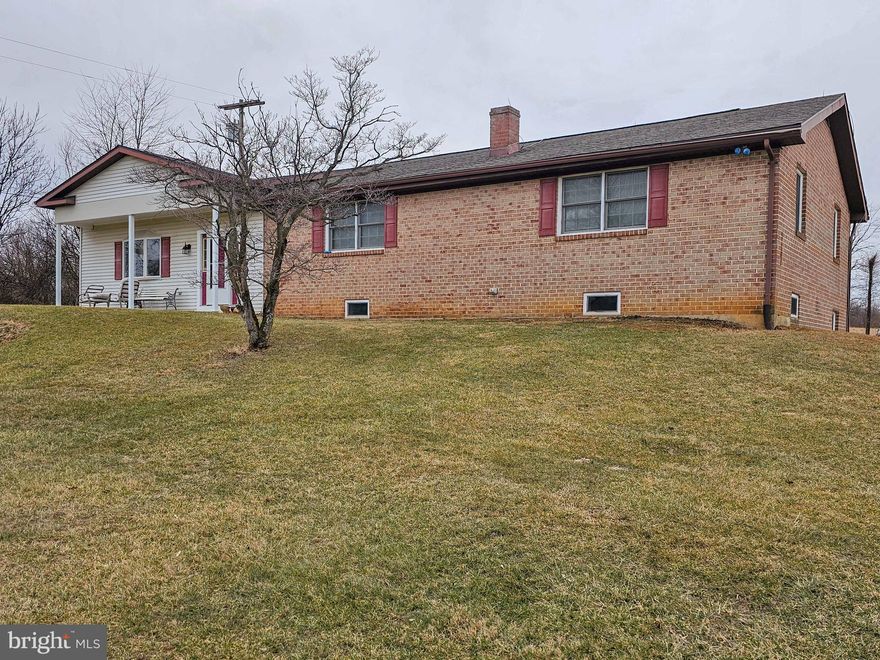 This well maintained rancher sits on 2.8 acres with easy access to the bypass.  2 bedrooms, custom kitchen, large living room with vaulted ceilings, dining room on first floor.  Lower level has 2 bedrooms, 1 bath, full kitchen, laundry area, and recreation room.  No smoking or pets.  Credit check and references required (Agent is owner).