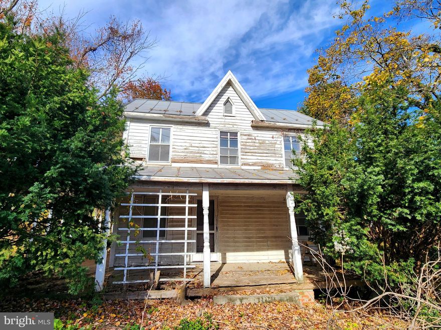 This sale includes two primary structures plus a detached garage on a 1-acre lot. Webb’s Store (ca.1897), formerly A&W Grocery, served the community for over 80 years and a Victorian home (ca.1899) located next door on the shared parcel. The property is situated at a four-way stop along a heavily utilized country road that offers plenty of public exposure for your business. Zoning is R-200/NR – Neighborhood Retail overlay allowing for a variety of potential residential and/or commercial uses. The corner store building is approximately 2,750 SFT and consists of a main floor with traditional general store floorplan and includes a restroom and large storage room. The upper level offers a large open space with high ceilings and additional restroom. Located just north along Clarksburg Rd, the included Victorian home is approximately 1,680 SFT and offers 3-bedroom 2 full baths. The metal roof on the home appears to have been replaced in 2008. Shared septic and well. Both structures will require extensive renovation and are being sold strictly as-is. The property is located within the Lewisdale Historic District but is not on the Historic Register. Potential buyers are encouraged to conduct their own due diligence for condition and acceptable use.