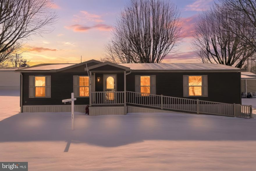 Welcome to this like-new manufactured home located in the Crestview Acres 55+ community. Built in 2019, this home offers modern comfort, thoughtful design, and easy living.

As you step through the front door, you’re greeted by abundant natural light from multiple windows and a welcoming open-concept layout that seamlessly connects the living room, dining area, and kitchen -- perfect for everyday living and entertaining.

The kitchen features ample storage, a center island with additional seating, and appliances that convey, making it both functional and inviting.

This home offers three nicely sized bedrooms, each with closets. The owner’s suite includes a private bathroom with double sinks and a walk-in shower with dual seating, providing comfort and convenience.

Additional highlights include off-street parking, an accessibility ramp, and low-maintenance living. Lot rent is $520 per month and includes sewer and trash services.

Schedule your showing today and come see all this beautiful home has to offer!