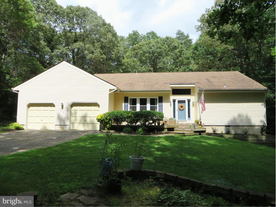 Fabulous remodeled rambler with tasteful upgrades, classy finishes--high ceilings create open, airy feel! Hickory floors, porcelain tile, cherry cabinetry, built-in bookshelves, ceramic tile. KT w/stainless appl's, soft-close drawers, pull-out shelves; FR w/woodstove; MBR w/WIC, gorgeous bath w/tiled shower, jetted tub. Gigantic deck, screened porch, recent HVAC, 2-car garage, .85 AC of privacy!