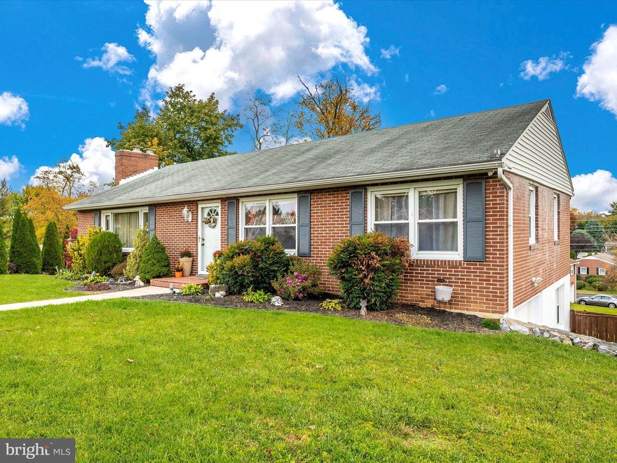 This All Brick Home will WOW you from the space inside to the view from your covered back deck! The Upper level features a spacious kitchen, living room with a beautiful fireplace & wood mantel, a formal dining room and three nice size bedrooms.  The Lower level has a Amazing Full Bath with tile shower and glass door leading into a Bonus Room with lots of natural light, a Huge Family room, a large rec room, utility room, and a walkout entrance. This home sits on a spacious corner lot, NO HOA, a large fenced backyard and an awesome view. Central A/C, 1 car garage with opener and shed! Make this house HOME!