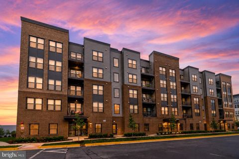 Photo of 21950 Garganey Terrace #407, ASHBURN, VA 20147 (MLS # VALO2126364)