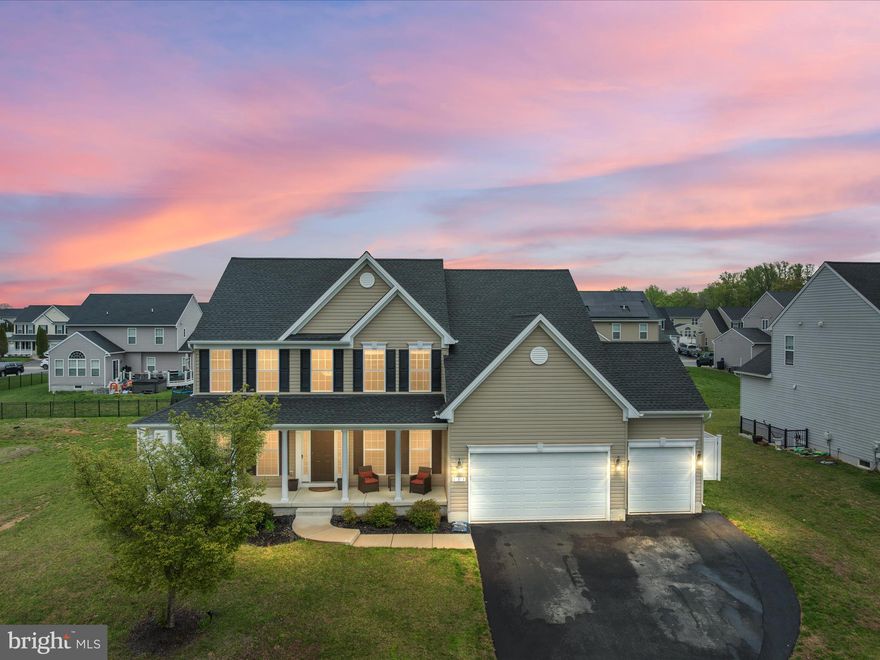 Just listed in the sought-after North Brook community—this stunning Colonial offers over 4,800+ sq ft of living space across three fully finished levels and is packed with the upgrades today’s buyers are chasing. Featuring 5 bedrooms and 5 full bathrooms, this home combines comfort, function, and wow factor. Step into the gorgeous, oversized kitchen with a gas cooktop, double wall ovens, a plethora of cabinet and counter space, and a layout that opens beautifully into a sun-drenched sunroom with massive windows pouring in natural light. The two-story living room with a cozy fireplace creates the perfect central gathering space, while the LVP floors and fresh paint throughout bring a crisp, modern feel. Upstairs boasts large secondary bedrooms, and there’s a main-level bedroom with full bath, perfect for guests or multi-generational living. The rare 3-car garage is a game-changer—nearly impossible to find in North Brook.

And the basement? It’s next level. You’ll find a full bar, home theater, game table area, huge additional living room, and a full bathroom—ideal for entertaining or just spreading out. The fenced-in backyard is perfect for kids, pets, and outdoor entertaining—or even a future pool. Located in a vibrant community with trails, playgrounds, and easy access to Rt. 301, this home is the total package. This much space, this many features, and a 3-car garage at this price won’t last—schedule your private tour before someone else beats you to it.