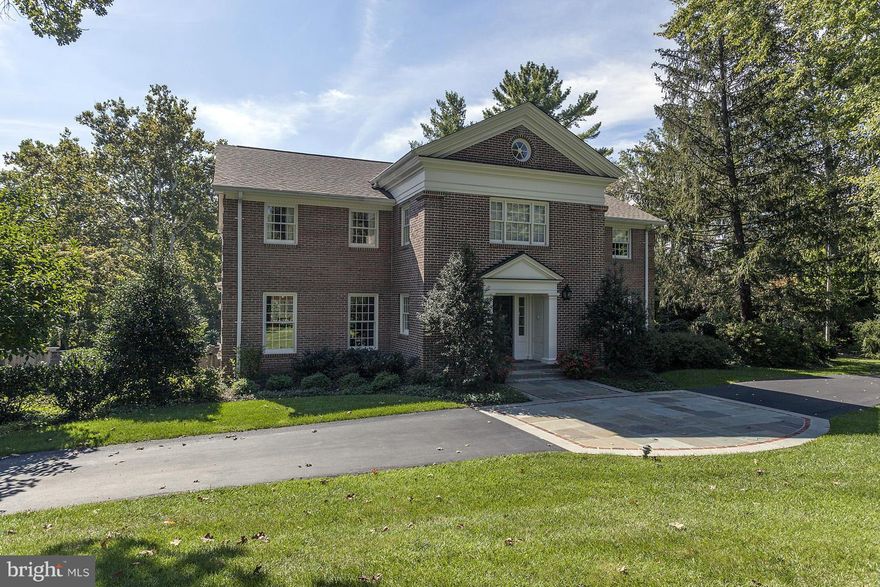 Traditional brick Colonial in friendly cul-de-sac neighborhood near Tysons & GW Parkway. Custom architectural details add character and charm. Kitchen opens to family room, sunroom and veranda overlooking spacious backyard with pool & terrace. Upper level has five bedrooms, including a master suite with dressing room & bath. Walk-out lower level with oversize 2-car garage and ample storage space.