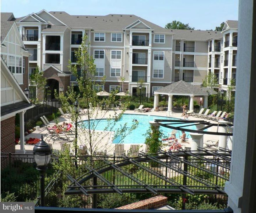 LUXURY 1 BR 1 BA Condo in sought after Bryson. Gourmet kitchen w granite counter-tops, ss appliances. Master has w/in closet, large soaking tub. Vaulted ceiling, private balcony. W/D in unit. 2 parking spots. Gorgeous landscaping. Gated community is steps away from Harris Teeter, Starbucks, Panera, etc. Tons of amenities including 2 pools, clubhouse, party room, fitness center & 24 hour security!