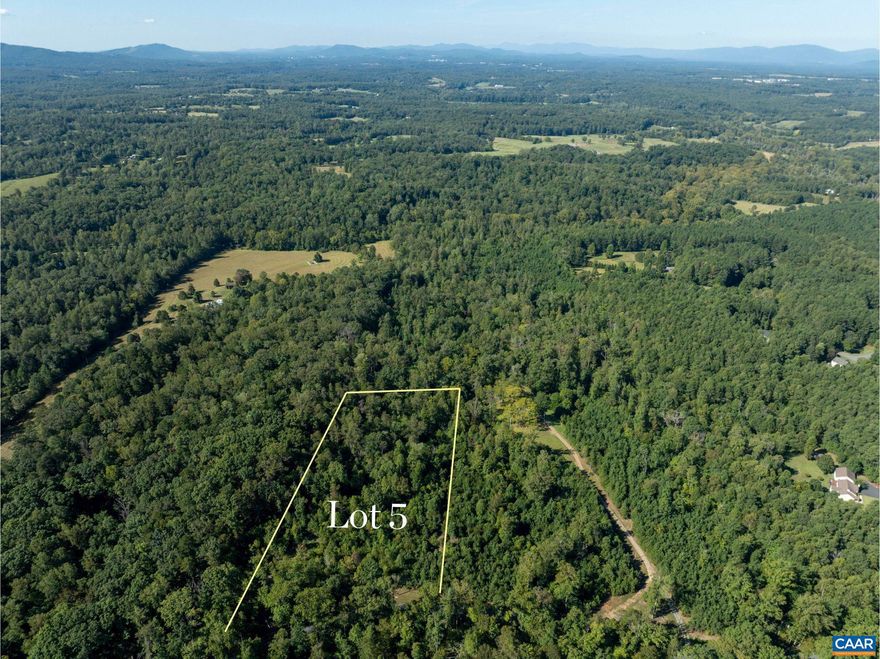 Lot 5 offers approximately 3.5 acres in Albemarle County, an ideal setting for a private homesite with a rural feel, yet within 20 minutes of downtown Charlottesville. The lot has been perked for a 4-bedroom conventional septic system and has access to electricity and high-speed internet, making it well-positioned for a custom build.  Bordering the established Ashleigh neighborhood, the site combines quiet seclusion with strong surrounding values. The land is gently rolling and wooded, offering the opportunity for selective clearing to open views while preserving privacy.  With mature land, a peaceful backdrop, and proximity to Turkey Run, the setting is well-suited for a primary residence or weekend escape. The location is particularly compelling given ongoing growth in this part of Albemarle County, including the development of a major bio-manufacturing facility nearby.  Conveniently located, the property is approximately 20 minutes to the Charlottesville Airport, 19 minutes to Pantops, and 14 minutes to Barboursville Vineyards.