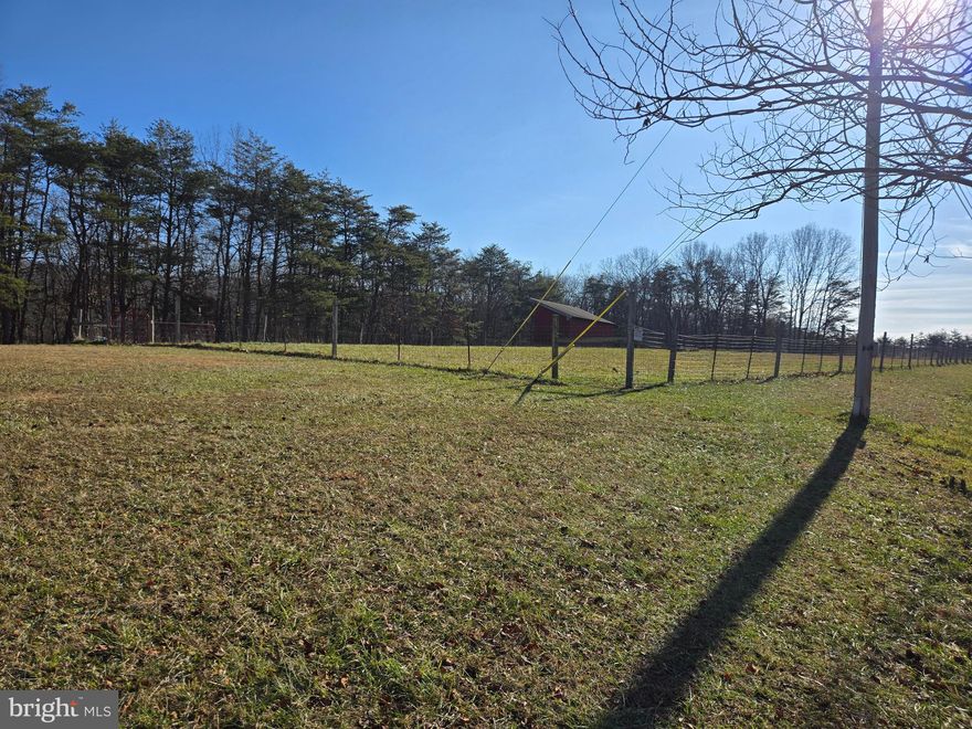 Build your dream home on this beautiful partially wooded, but mostly cleared 2.39 acres in Morgan County WV, just minutes from the VA line.  2 stall barn  and fencing on lot.  Well permit on file.   Land only has 1 restriction and that is no trailers or mobile homes.