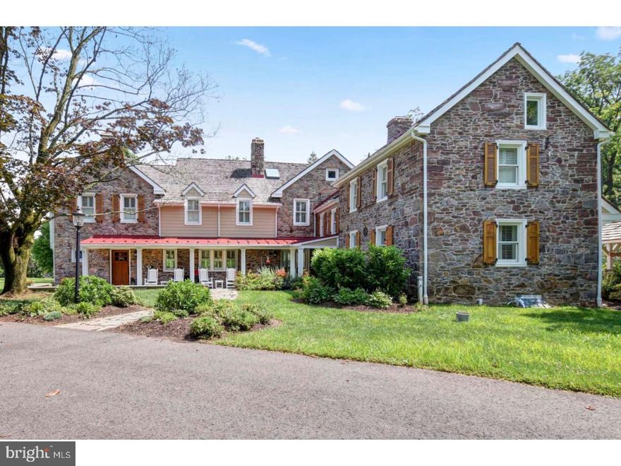 This pristine and quaint private 5+- acre estate nestled on a beautiful country road combines the best of history with sophisticated design. Exquisite grounds with sweeping views of the lawn, mature specimen trees and landscape features, surround the compound of this stately house and other out buildings. The house represents the highest level of traditionally detailed improvements, and is updated with striking exquisite design and detail. Expertly crafted mill work and Architectural Digest level character can be found everywhere:  The bespoke kitchen, with wood countered island along with Custom made bar are among many standout aesthetic treats. This Dilworth Custom designed kitchen is a fully functioning chef's working kitchen and also an elegant social center for any dinner party. The kitchen is outfitted with granite counters and all Thermador Stainless appliances and a unique locally milled ghost maple table are but a few of the many features in this elegant and generous kitchen. There are two large sinks one farmhouse and  the other in the counter. This whole area including the connecting intimate family sitting room the custom made bar area with Ghost Maple top and copper sink and tiles and is a jewel of a space designed by the architect Neil Lambert.  The large walled deck with flagstone affords a high ground and sweeping view of the gently sloping landscape and the newly restored Ice house.  This family home was originally a classic 2-story  early 1724 century Pennsylvania farmhouse. It was upgraded primarily in two successive additions: at the turn of the 20th century and again in 2015. The first floor includes formal and elegant historical spaces for living, dining, study and relaxing; there is even an original working fireplace renovated with Hand made Glazed sand and stone tile. The second floor master suite includes a bedroom, a large hall of closets, full marble bath.  Three additional bedrooms and two baths complete the second floor all with handpicked hardware and lighting. There is a detached two car heated garage as well as a beautifully constructed car barn which can hold 10 cars which is air conditioned, heated and has a sprinkler system ...a car collector's dream. It encompasses a view of the 1852 barn, and other out buildings integrated into it and overlooks the expansive pristine grounds. A perfect estate for the car collector and/or the equestrian!