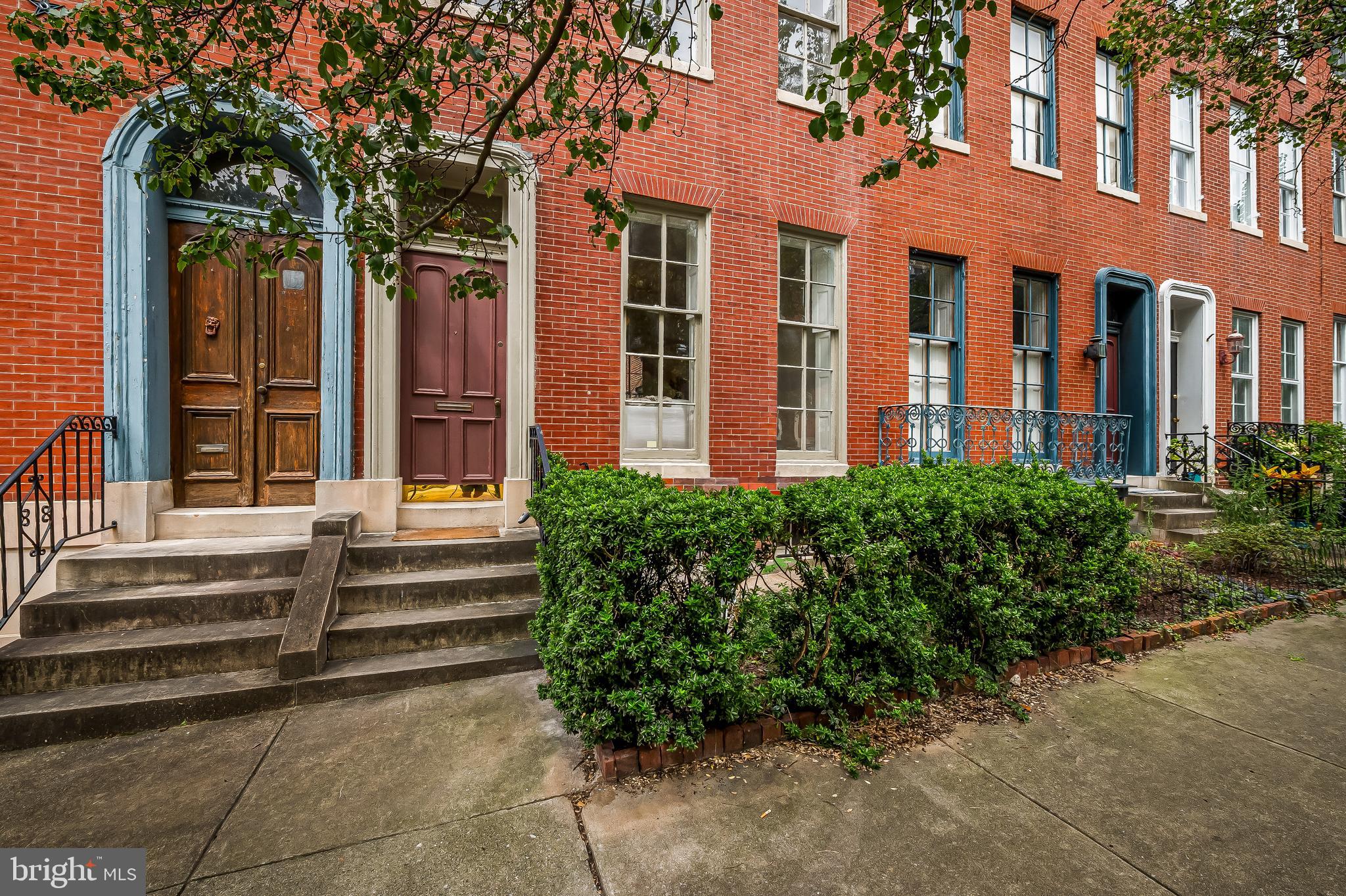Welcome to this stunning 1880s townhouse in the heart of historic Bolton Hill, offering the perfect blend of architectural grandeur and modern comfort. With over 4,000 square feet of finished living space—including 3,144 sq ft above grade and 900 finished sq ft below grade—this home provides exceptional scale, flexibility, and charm.
Inside, you’ll find four spacious bedrooms, three of which feature private ensuite bathrooms, providing comfort and privacy for residents and guests alike. The fourth bedroom offers an exciting opportunity to create a luxurious primary suite tailored to your taste and needs.
The home showcases exquisite original details including marble fireplace mantels, tall ceilings, and rich woodwork throughout. All fireplaces are currently decorative, preserving their architectural character and offering future potential for restoration.
The brand-new kitchen is equipped with quality cabinetry, sleek countertops, and stainless steel appliances—ideal for daily living and entertaining. The finished lower level, complete with a half bath, is perfect as a teen lounge, rec room, guest suite, or in-law space, providing even more versatility.
Updates include include: Kitchen (2025), white reflective roof with 30yr expected life (2015), gas boiler with two heat zones (2016), central air (2023), delivering modern comfort with long-term peace of mind, and hot water heater (2006).
At the rear of the home, a rare two-story carriage house provides private parking and potential for a home office, art studio, craft workshop, or creative workspace. The carriage house is being conveyed as is. The fenced backyard is spacious and full of potential—ready for a garden, play area, or outdoor entertaining space.
Located on a quiet, tree-lined block with easy access to neighborhood favorites like On the Hill Café, CookHouse, and nearby green spaces, this home also offers unbeatable commuter convenience—just minutes from Penn Station with direct MARC, Amtrak, and Acela service to Washington D.C., Philadelphia, and New York City.
This is a rare opportunity to own a historic Baltimore townhouse with flexible living space, thoughtful updates, and prime location in one of the city’s most beautiful and connected neighborhoods.