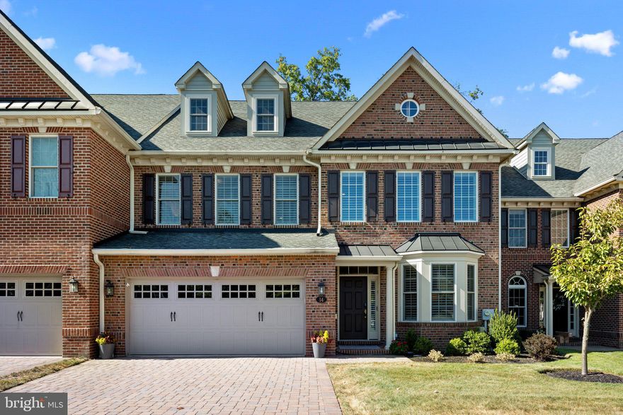 Welcome to this stunning residence in the highly sought-after Delancey Court community of Newtown Township, built by McGrath Builders. This exquisite home is a combination of elegance with a modern twist while being in a prime location. As you step inside, you're greeted by a grand foyer with gleaming luxury plank floors that flow seamlessly throughout the main level. The open concept design creates an inviting atmosphere, perfect for entertaining and everyday living. The formal living room, bathed in natural light from large windows, offers beautiful views of the surrounding landscape. The heart of the home is the gourmet kitchen, a culinary enthusiast's dream with high-end appliances, custom cabinetry, quartz countertops, and island seating. Adjacent to the kitchen, the breakfast area provides a cozy spot for casual dining, while the formal dining room is perfect for hosting elegant dinner parties and holiday gatherings. Relaxation and comfort await you in the spacious family room, featuring a fireplace and soaring ceilings, ideal for unwinding or gathering for movie nights. The luxurious master suite offers a tray ceiling, ample closet space, and a spa-like en-suite bathroom with dual vanities and a separate walk-in shower. Upstairs features two additional generously-sized bedrooms with easy access to a well-appointed bathroom, and a spacious loft completing the second level. The third level den/flex space offers storage and a large area for use as an additional living space, home office, or bedroom. Outside, the lush landscaping and manicured grounds create inviting curb appeal, while the backyard offers a private oasis with a Trex deck, perfect for relaxing, barbecuing, or enjoying the tranquility of nature.