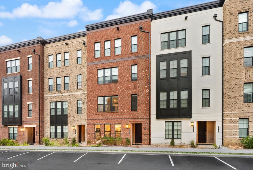 Sophisticated Toll Brothers Townhome | Union Park at McLean
Why wait to build? This impeccably maintained Toll Brothers townhome — completed in 2022 and barely lived in — delivers the polished feel of new construction without the timeline. Nestled in the sought-after Union Park at McLean community, this residence perfectly blends contemporary high-end design with everyday functionality in one of Northern Virginia’s most premier locations.

The thoughtfully designed open floor plan is bathed in natural light, thanks to oversized windows and soaring 9-foot ceilings. Luxury Vinyl Plank (LVP) flooring flows seamlessly throughout the main levels, providing a durable, waterproof, and ultra-stylish anchor to the living space. At the heart of the home, the gourmet L-shaped kitchen impresses with expansive granite countertops, premium stainless steel appliances, and a generous center island — the perfect setup for a high-traffic morning routine or hosting weekend guests.

Retreat to the expansive owner’s suite, complete with a large walk-in closet and a spa-inspired private bath featuring double vanities and an oversized shower. Every additional bedroom offers its own walk-in closet — a rare find — and the conveniently located upstairs laundry room adds a level of ease to daily life.

Step outside and you’re minutes from it all: Wegmans, Capital One Center, Tysons Corner Center, and Tysons Galleria place world-class dining, shopping, and entertainment at your doorstep. Commuters will appreciate seamless access to I-495, I-66, Route 123, and the Dulles Toll Road.

Kindly schedule showings online. Shoe covers or shoe removal appreciated — thank you!