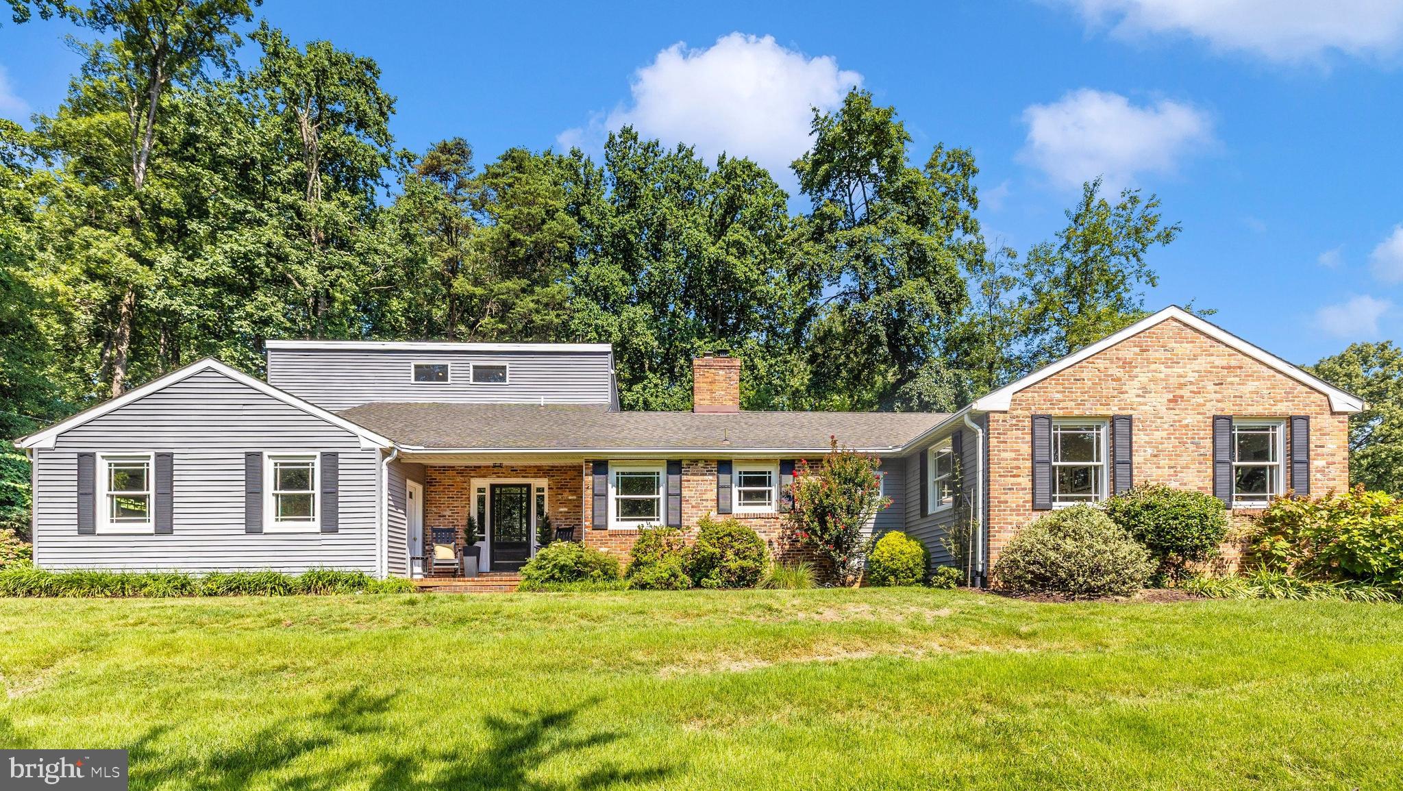 If you’ve been waiting for a 5 bedroom, 3.5 bath home in Ulmstead Estates, then today is your day! Seated on more than a half acre, this beautifully well-maintained home offers an abundance of indoor and outdoor living and entertaining space. Open the front door to the welcoming foyer and experience the great flow and design of the main floor! The living room boasts a charming fireplace (gas) and the heart-of-the-home gourmet kitchen opens to a spacious family room on one side and an extensive dining room on the other, along with a powder room in the hall. The amazing view through the French doors and large windows in the family room allow you to enjoy the outdoors while indoors, or step out into the private and superbly landscaped backyard oasis, which is perfect for either hosting or quiet meditation. Still on the main floor, but separated from the living space, are 4 of the bedrooms, including the primary with en suite bath, another full bathroom and the laundry room. Upstairs you’ll find the 5th bedroom, a large sitting room and the third full bathroom, creating a semi-private space that could be used for guests, older children or an in-law suite! The basement affords significant storage, workbench, and a door to the backyard. Parking is never an issue with the large driveway and 2 car garage. Living in Ulmstead Estates on the Magothy River can be as serene or as active as you choose! Ulmstead Estates Club offers 2 private marinas with boat slips, a community pool, tennis courts, pickleball courts, ballfields, picnic and playground area at Ulmstead Beach, and a year round calendar of activities. This highly sought after community is minutes to downtown Annapolis, and commutable to Washington DC, Baltimore and BWI Airport. Welcome home – 1043 Placid Ct is move-in ready and waiting for you!!