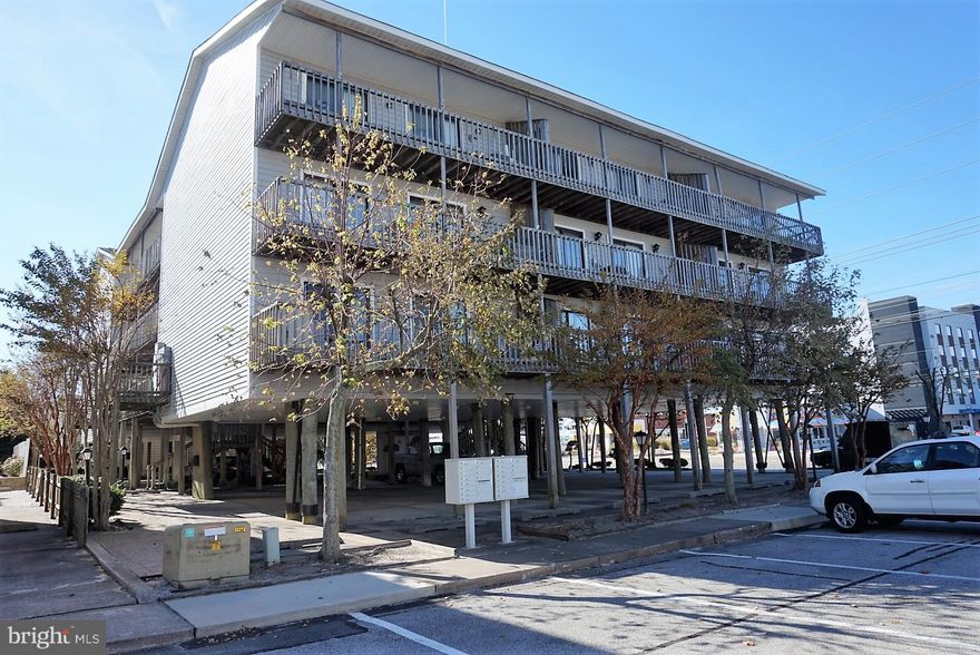 A must-see condo on the ocean side of Coastal Hwy in North Ocean City!  A short walk to the beach and many of desirable North Ocean City's best restaurants, bars, shops, and 58 acre Northside Park and Recreation Center (playgrounds, piers, sports fields, gyms and home to Sundays in the Park and weekly fireworks in the summer). This is the perfect home-base for beach fun, crabbing, walking, biking and experiencing all that Ocean City has to offer! Turn key and ready for you to enjoy! Many upgrades, including: a renovated kitchen with maple cabinets and granite counter tops, stainless steel appliances, gorgeous bamboo floors, carpeted bedrooms and tiled bathrooms, new A/C condenser in August 2018, new refrigerator in August 2018, beautiful teak overlay flooring on the deck.  Includes one assigned parking space and one off-street guest parking space with low annual condo fees.  OPEN HOUSE Saturday Dec 8th from 11am-1pm!