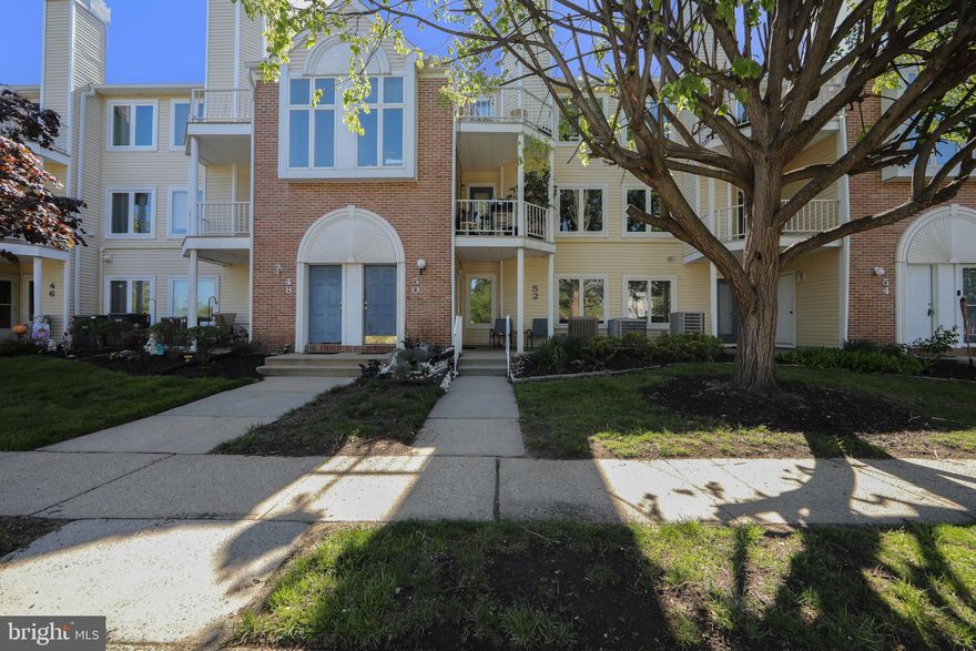 Beautifully remodeled and truly move-in ready, this desirable first-floor condo offers easy, low-maintenance living with no interior steps to worry about. Perfectly situated just a stone’s throw from the community clubhouse and pool, you’ll be ready to enjoy summer from day one. Inside, the spacious living room flows seamlessly into the dining area, creating an open and inviting layout ideal for everyday living and entertaining. The updated kitchen features newer cabinetry, granite countertops, and a convenient pass-through window overlooking the dining room. A large walk-in coat closet provides excellent additional storage space. The generously sized primary bedroom offers a large walk-in closet, private access to the fully remodeled bathroom, and French doors leading to the back patio with a secure outdoor storage shed. A second bedroom and separate utility/laundry room add even more convenience and functionality. Complete with a designated parking spot and in great condition, this condo is ready for its next owner. Just pack your bags and move right in. Property is being sold as-is. Welcome home!
