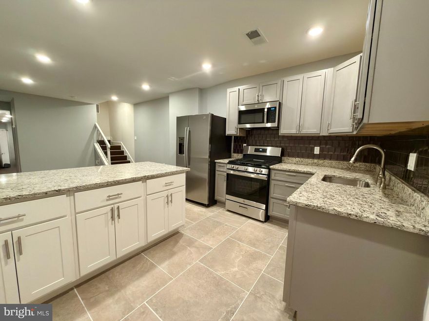 Fully renovated townhome in Baltimore featuring 3 bedrooms, 2 full baths, and 1 half bath. This move-in-ready home offers a fresh, modern interior with brand-new appliances, updated kitchens and baths, and stylish finishes throughout. Bright and open floor plan ideal for comfortable living and entertaining. Conveniently located near major commuter routes. A great opportunity to own a turnkey home in the city—schedule your showing today