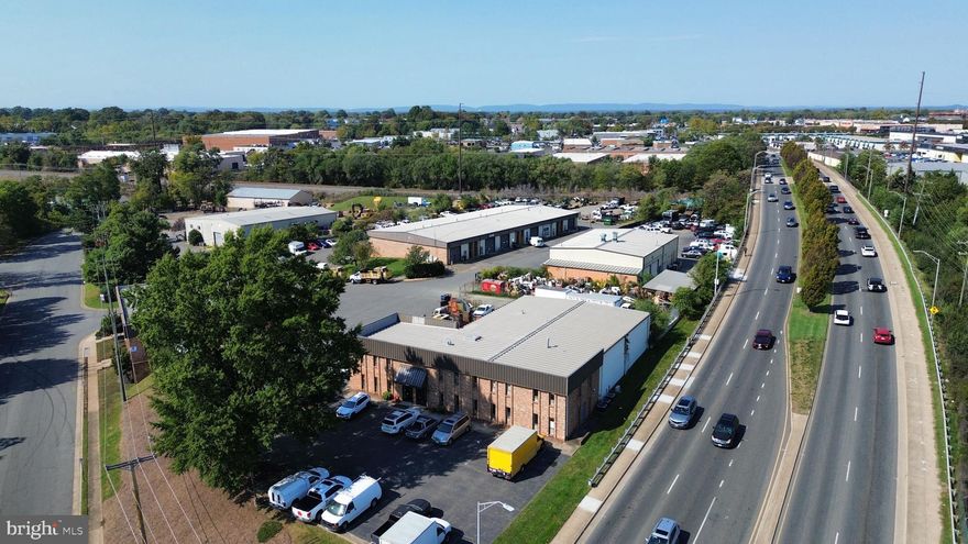 CALLING ALL CONTRACTORS! This prime location for sale on the corner of Quarry Road and Liberia Avenue in the City of Manassas has it all: 1/2 Office, 1/2 Warehouse and Outside Storage. The 9,000 SF building includes two over-sized drive-in-doors, showroom, server room, conference room, waiting room, reception, kitchen, ten private offices and two small fenced outside storage yard with electric. Zoned I2 in the City of Manassas.