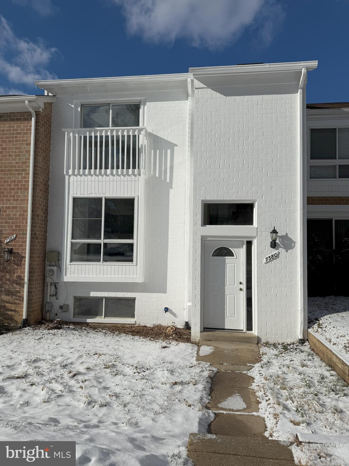 Freshly painted brick TH, walk to Lake Elkhorn! Pergo floors through out. Sliding door off living room to deck. LL is fully finished w/sliding doors that lead to a fenced yard. 4 bedrooms 2 full baths 1 1/2, Parking, COVERED CARPORT included. Come take a look.