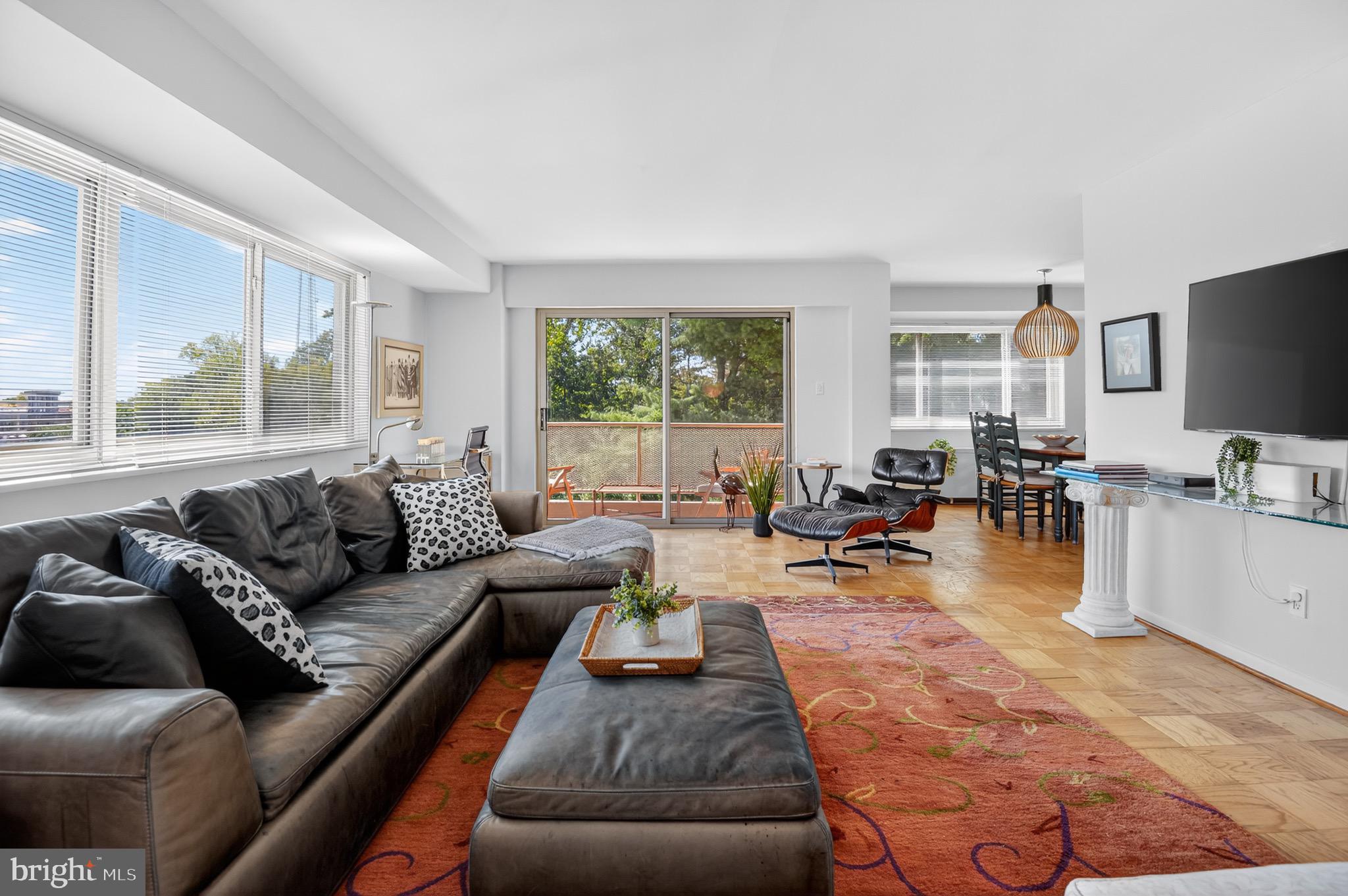 Spacious & Sunlit 2-Bedroom Coop in Chevy Chase.
Discover this rarely available 1,300 sq. ft. corner residence offering 2 bedrooms, 2 full baths, and a wraparound design that floods the home with natural light. Surrounded by lush gardens, mature trees, and direct access to the Capital Crescent Trail, this home combines tranquility with unbeatable walkability—just minutes to vibrant downtown Bethesda dining, shopping, and Metro.
Step inside to find a home that has been thoughtfully updated from top to bottom with no detail overlooked:
Fully remodeled kitchen with all new cabinetry, stone counters, appliances, lighting, flooring, plumbing, and upgraded 125-amp electrical system
Two renovated bathrooms featuring Porcelanosa cabinets, modern sinks, faucets, new toilets, lighting, and refinished tubs
Refinished hardwood floors, fresh paint, new solid wood doors with upgraded hardware, and custom cordless window treatments throughout
Expanded entryway for a welcoming sense of arrival
New balcony and flooring to enjoy serene outdoor views year-round
Practical updates include all new wiring, shut-off valves, circuit breakers, and a refreshed ceiling/wall finish—ensuring beauty meets reliability.
Amenities enhance the lifestyle: a private storage unit, indoor reserved garage space plus an additional reserved outdoor space, ample guest parking, and a bike room with direct trail access. Spring brings cherry blossoms right to your doorstep, creating a picture-perfect setting.
Whether you’re seeking a serene retreat with green views or a dynamic urban lifestyle steps from Bethesda Row, this home offers the best of both worlds.