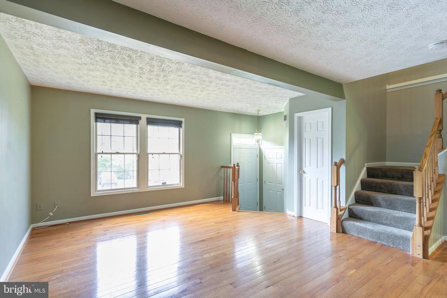 Frequently overlooked due to 21226 area code, this Pasadena area  of Chestnut Hill Cove is a delightful, well planned out community with wide landscaped streets for easy walking or jogging all to a community marina and picnic areas. This home has added nice hardwoods throughout and features nice light. Community laid out nicely with secure storage for RV's and boats, so there are lots of extra parking with no ugliness of circling for an extra spot at night when you get off of work. Community is a stones throw to 695, BG&E, Baltimore and NSA but tucked away as a retreat  from the busy world. This home has a finished basement with a full bath which is a great in-law or rental  and walk-out to wooded private yard. 2 master bedrooms upstairs with a roomy full bath and a closet organizer walk-in closet. Home is priced under market for quick sale and to compensate for some future sweat equity projects like a new kitchen, a deck and fenced yard. Totally livable with tons of storage, but could be a showplace with instant equity. As-is