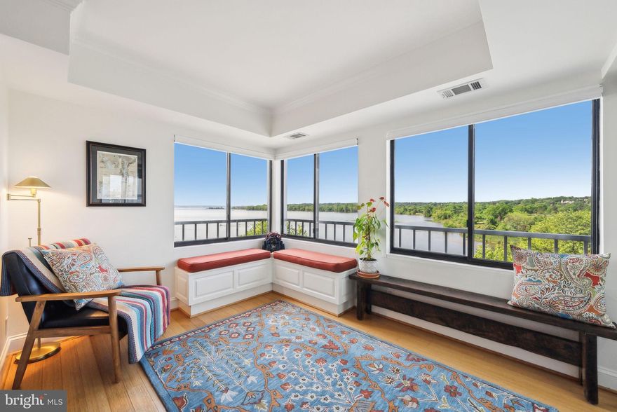 Show stopping panoramic views of the Potomac River from nearly every room combined with resort style living make this newly updated 2 bedroom, 2 bath plus den home the perfect spot to call home. Located on the coveted southern side of Porto Vecchio with two garage spaces and dedicated storage space . Rare offering in Porto Vecchio .  See 3D tour

 
Upon entry into the gracious foyer your eyes will immediately be drawn to the sparkling waters of the Potomac River.  From there the living room invites and is open to the dining room and adjacent to the spacious kitchen creating the perfect flow for entertaining and comfortable daily living.  The current owners have enhanced the ample kitchen by adding new quartz countertops(extending them to allow for counter seating), new glass tile backsplash, new sink, new faucet, and new luxury vinyl flooring. (appliances 2020).


Just off the lovely living room is the stunning library/den with floor to ceiling windows and views for days of the Potomac River- the perfect spot for your work from home days or to just relax, watch the birds and reflect by the water.

Enjoy your morning coffee watching the sun rise and nature coming to life on the Potomac River in the climate controlled enclosed terrace with entrances off  the living room and both bedrooms. Perfect spot to watch the various firework shows at nearby Belle Haven Country club or simply enjoy the moods of the river. 

The luxe primary suite is a delight with a complete top to bottom remodel of the primary bath. You will love the spa-like feel of the rich wood double vanity with quartz counters and the custom, seamless glass enclosed shower with rain head and hand shower. Two additional custom closets were added in the separate dressing area for plenty of storage.

The second bedroom has custom built ins making it the perfect office or guest retreat. The en suite bathroom has been updated with a new bath tub, flooring and tile. 

The lovely powder room, just off the foyer has also been given a chic refresh with a new mirror, faucet, hardware, sconces and accent wallpaper.

2 (Rare!) garage spaces #102 and #204 (one is close to the elevator) and a separate storage unit plus loads of storage throughout round out this offering. 

Not that you will ever want to leave this gorgeous space but Porto Vecchio has amenities galore including a private limousine service for all residents, elegant party rooms perfect for hosting the numerous events organized weekly by residents' very active social committees, an in-house weekly newsletter highlighting various seasonal changes in the abundant surrounding trees. plants and wildlife and along the Potomac River, two newly renovated exercise rooms, 24 hour front desk, on-site management and excellent security. Outside you will be wowed by the gorgeous pool overlooking the river, extensive and professionally-maintained landscaping, kayak dock, and extended pier with grilling stations, the over 270 bird species inhabiting the adjoining Dyke Marsh Wildlife Preserve (including two active Osprey nesting sites), kayak storage and private tennis/pickleball court. 

Convenient to Reagan National Airport, Amazon HQ2, the White House, Capitol Hill and all that Old Town and DC have to offer. Walk to the shops and restaurants in Old Town and take advantage of the Metro bus stop steps away from the building for 10-minute commutes to the Braddock Road Metro with direct service to the Pentagon stops and DC. Enjoy the bike trails and parks just outside your door.