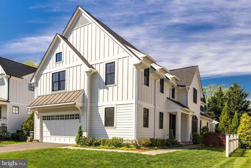 An exceptional opportunity for a better than new custom home built by Buchanan-Price, a local McLean builder known for their quality and attention to detail. Much bigger than it looks, this modern farmhouse offers approx. 6,100 SF with stunning 10’, 13’ and 16' ceilings on the main level, a MAIN-LEVEL Primary Suite, designer finishes, and a fantastic outdoor space that will captivate even the most discerning buyer. Located on a great street in the heart of the Village of West McLean, a sought-after community with excellent proximity to downtown McLean.

 Step inside and be wowed by the open floor plan, designed by architect Richard Foster of Foster Zimmerman. This home effortlessly blends sleek, contemporary design with soaring ceilings and farmhouse charm. From the Mahogany front door to the custom white oak, wide plank flooring, every detail has been carefully curated to ensure luxury and comfort at every turn.  

 The showstopper on the main level is a great room with 16’ ceilings + windows and gorgeous oversized gas fireplace, adjacent to the main level primary suite with 13’ ceiling. The suite with spa bath provides the ultimate retreat with its volume ceiling and luxurious finishes. Upstairs, there are 4 additional bedrooms & 3 baths that all open onto an upper family room. Bonus stackable laundry unit was added for convenience. 

 Gather in the light-filled kitchen, where modern high-gloss cabinetry with soft closing hardware and top-of-the-line appliances create a culinary haven. Designer lighting illuminates the kitchen island, while a waterfall countertop and custom backsplash adds to the sophistication. The home offers two laundries plus an additional laundry hookup in the mudroom, and an attached two-car garage complete with custom storage and an epoxy floor. Relax and unwind in the delightful outdoor living room, with a gas fireplace and surrounding pergola, perfect for enjoying cozy evenings under the stars. Entertain with ease in the finished lower level, complete with a wet bar and gas fireplace with stone surround, the 6th bedroom or office and full bath, laundry room, workshop and large storage room. 
￼
 This exceptional home offers the perfect blend of sophistication and warmth. Don't miss your chance to experience luxury living at its finest – schedule a visit today and make this dream home yours.