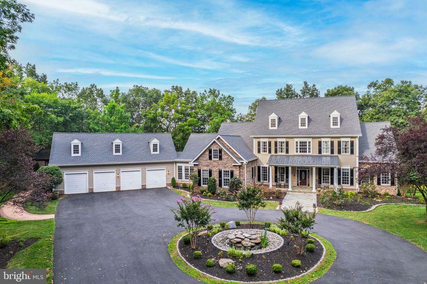 Executive Luxury Estate on 10 Private Acres
Welcome to your own private sanctuary — a gated executive retreat nestled on 10 acres of pristine landscape, complete with a circular hardscaped driveway and breathtaking curb appeal. This custom-built masterpiece features a 4-car garage, professional landscaping, and exceptional craftsmanship throughout,brand-new roof (2025)
Inside, the main level primary suite offers a spa-like escape with a Jacuzzi tub, walk-in shower, dual closets, linen storage, a dressing room, and French doors that open to your private deck with tranquil wooded views.2ndbd or Office/study
The grand foyer opens to soaring cathedral ceilings in the family room, highlighted by a stacked-stone wood-burning fireplace. The open gourmet kitchen is a chef’s dream, boasting two islands, butler’s pantry, walk-in pantry with a second refrigerator, two sinks, gas range, wall oven, built-in microwaves, and elegant finishes. A breakfast sunroom and screened patio invite relaxed living, while the vast wrap-around deck provides unmatched views — including winter mountain vistas.
Enjoy serene outdoor living with a koi pond, stone stairways to Catharpin Creek, private nature trails, and abundant wildlife sightings. Entertain in style with an outdoor stacked-stone pizza kitchen, wood-burning oven, fireplace, covered pergola, and charming water features.
Upstairs offers a loft, 3 bedrooms with a Jack-and-Jill bath, plus a separate guest suite with a private full bath. The finished basement is a true entertainment haven — complete with a billiard room, gaming area, half bath, full brass rail bar with wine refrigerator and dishwasher, guest bedroom with full bath, stacked-stone and gas fireplaces, built-in surround sound, and walk-out access to the grounds. Over 1,900 sq ft of unfinished storage provides endless potential. This is more than a home — it’s a private luxury lifestyle, just minutes from modern (Haymarket conveniences, Old`town, Giant, Schools, Commuter lot, National Battlefields, John long Park. The riding club, Golfing!  Yet this stunning retreat is worlds away from the everyday.