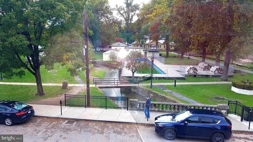 Luxury Apartment - Superb! One BR, in Town. Living room with bay window overlooking the State Park and town pool.  This view is why people move here! Quality carpet, walk-in closet, ceramic tile in kitchen and bath.   No Pets, No Smoking. Owner pays, water.sewer.trash.   HVAC system for heat/air. The Park is beautiful!  There is paid pool use and the Springs coming out of the mountain to put your feet in, spa's, picnic tables and the lovely Warm Springs Run meandering thru the park.  Plenty of restaurants, antiques shops, gift shops and community happenings in the park and around the town.
Also have a locked entrance door leading to the only 3 apartments above.
Available for move in JULY 1, 2024
Appts must be made over phone to schedule with property manager