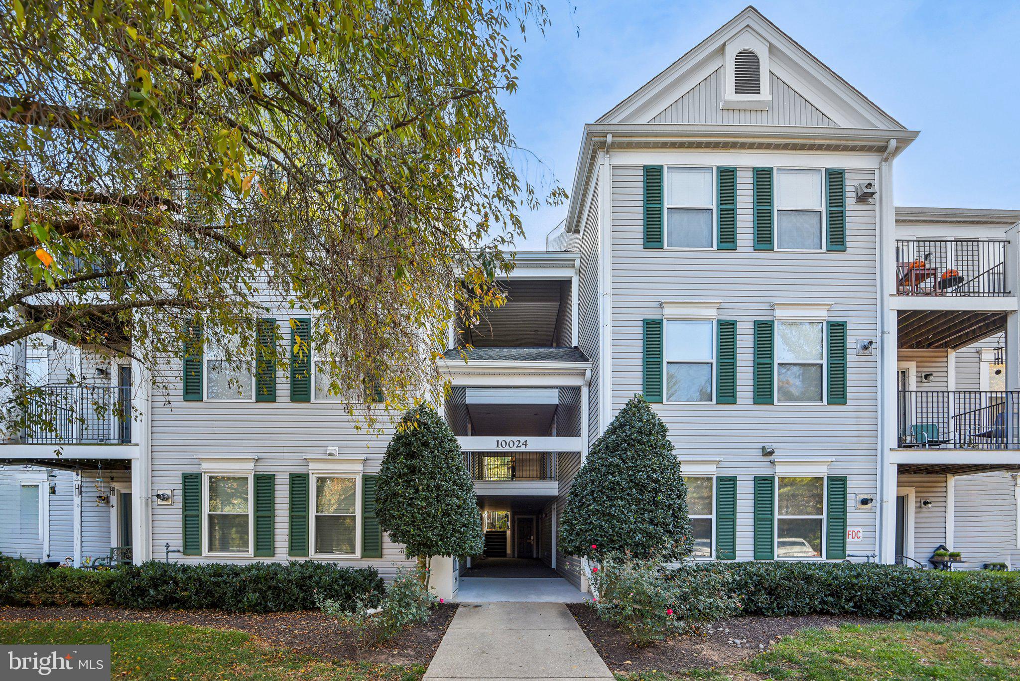 Rarely available top floor unit in Decoverly (no noisy upstairs neighbors) is ready for move-in! The recently painted main level has an open floor plan with hardwood floors, separate dining area and three proper bedrooms. The living area has a gas fireplace and opens to a balcony overlooking green space. The kitchen has been updated with granite countertops and stainless appliances. A full-sized stacked washer & dryer is here for your convenience. All of the bedrooms are generously sized, have hardwood flooring and the primary has a walk-in closet and en suite bathroom that also opens to the front entry hall. The other two bedrooms have an adjoining bath set up. Upstairs via a spiral staircase you will find a huge bonus loft space with another spacious walk-in closet to meet all of your storage needs. The loft makes a great game/play room, workout studio or office space! The Decoverly neighborhood has a community pool, tennis courts, walking trails and a dog park. Plus you are just minutes to all that Downtown Crown and Rio have to offer - great retail, a wide variety of restaurants and conveniences such as Harris Teeter and Target.