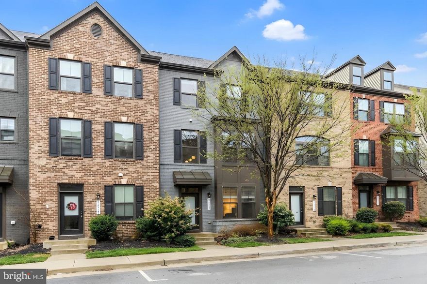 Welcome to urban chic! This beautifully maintained 4-bedroom, 3.5-bath townhome in the sought-after community of Westmoore at Moorefield in Ashburn. Built in 2018, this modern home offers stylish finishes, flexible living spaces, and a thoughtful layout designed for today’s lifestyle.
The entry level features a private bedroom with a full bath, ideal for guests, a home office, or multi-generational living. Hardwood flooring spans the entry and main levels, leading to a bright and open main living area perfect for everyday living and entertaining.
At the center of the home is a well-appointed kitchen with a large island, generous dining space, and plenty of storage. The open-concept design flows seamlessly into the living area and out to a covered deck—an inviting spot to enjoy your morning coffee or unwind at the end of the day.
Upstairs, the spacious primary suite provides a comfortable retreat with a large walk-in closet and a spa-like bath featuring dual vanities and a luxurious shower. Two additional bedrooms, another full bath, and convenient upper-level laundry complete the top floor.
Additional highlights include smart home features, a high-efficiency water heater, Bosch dishwasher, Ecobee thermostat, and LG washer and dryer. The two-car garage with driveway parking adds everyday convenience.
Westmoore at Moorefield residents enjoy outstanding amenities including scenic walking trails, a lakefront clubhouse, fitness center, pool, playgrounds, dog parks, and community gathering spaces. Ideally located just a short walk to the Ashburn Metro Station on the Silver Line, with easy access to One Loudoun, Brambleton Town Center, major commuter routes, dining, shopping, and Loudoun County’s renowned wineries.