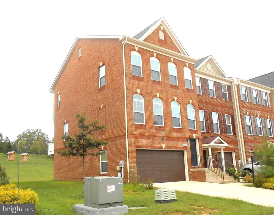 NO NEED TO WAIT FOR NEW CONSTRUCTION!!  SHOWS LIKE A MODEL.  END UNIT W/ 2 SIDES BRICK.  GRANITE COUNTERS,  STAINLESS APPLIANCES, NEW CARPET, GLEAMING HARDWOOD FLOORS AND HUGE 2 CAR GARAGE.  RELAX ON THE DECK OR FINISHED BASEMENT.