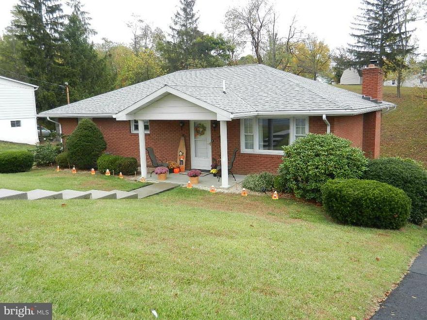 Move-in condition brick rancher in quiet, convenient location.  Beautiful oak flooring throughout most of main floor.  Extra large family room, with fireplace, bar and covered outdoor patio.  Equipped kitchen plus nice dining area and sunroom with attached deck.  Well landscaped lot with paved driveway and one car garage.  A must see property for anyone looking one story living.