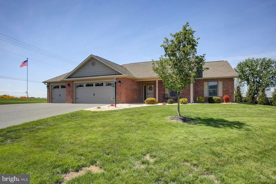 Welcome Home! - this one level, open floor plan home, offers 3 bedrooms and 2 full baths. This home features beautiful custom LVP flooring and a cathedral ceiling in the large living room. The kitchen boasts gorgeous granite countertops, stainless steel appliances, a breakfast bar, and an adjoining dining area.  A patio is also just outside the dining room. The Master bedroom is joined with a large master bath and a fabulous walk-in closet. Other features include an oversized Three car garage, a large storage area in the back of the garage, a covered front porch, and a shed and privacy tree line at the rear of the property.
This home is in Guilford Township and is within 2 miles of I-81, restaurants, shopping, medical facilities, schools, and the Chambersburg Aquatic Center. No HOA, No Township Taxes. Call today to schedule your personal tour!