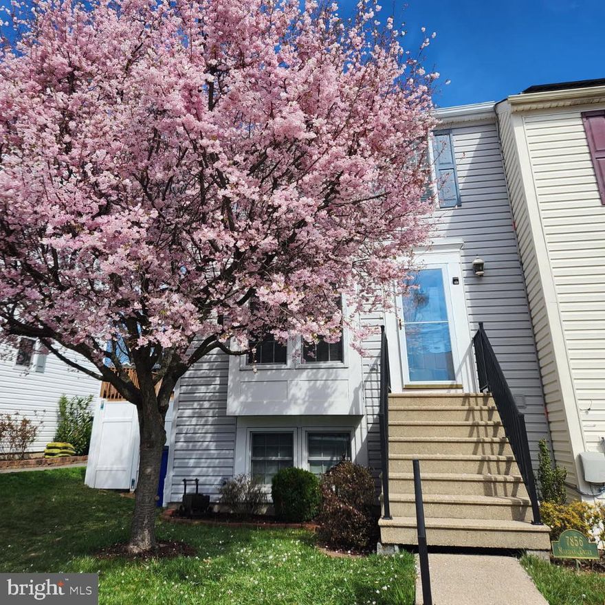 This beautifully updated and meticulously cared for townhome offers a practical, comfortable layout with modern finishes throughout. Built in 1984 and spanning 1,443 square feet, it features three bedrooms, three baths (including two en-suite upstairs), and a fully finished lower level for flexible living space. Inside, bright living areas are anchored by a fireplace, while the updated kitchen includes white cabinetry, stainless steel appliances, and a clean tiled backsplash. The open flow connects seamlessly to dining and living spaces for easy everyday living.Upstairs, both primary bedrooms have private baths. Downstairs, the finished basement works well as a home office, guest area, or recreation space.Outside, the two-level deck is the standout—ideal for coffee in the morning or unwinding in the evening. A small garden, mature tree, and storage shed complete the low-maintenance backyard. Located in the Howard County school district with quick I-95 access, this move-in-ready home delivers updated interiors, practical square footage, and usable outdoor space in a convenient Elkridge location.