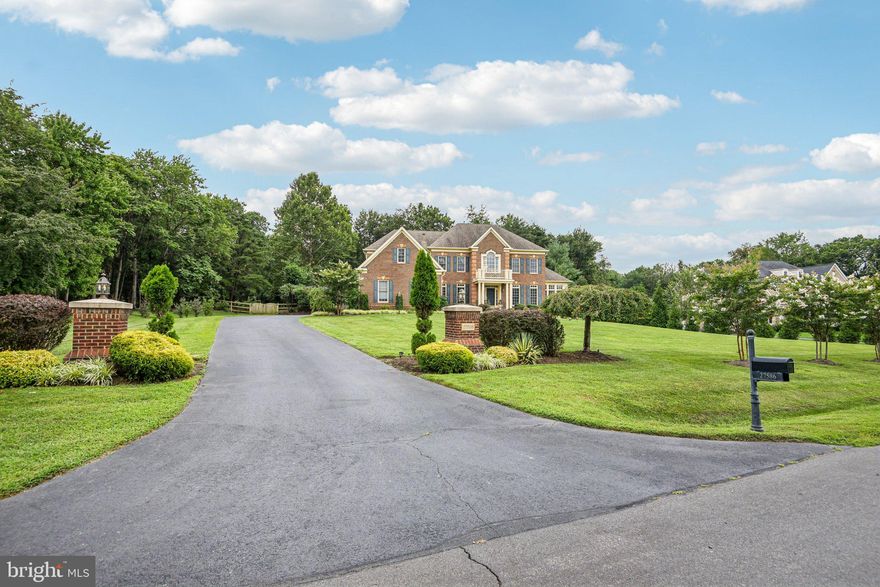 Entertainer’s Delight on Over 3 Private Acres – A True Luxury Retreat

Welcome to your personal oasis—this extraordinary residence is nestled on over 3 acres of beautifully landscaped, tree-lined privacy, offering a rare blend of luxury and serenity. The setting is peaceful and secluded, yet perfectly designed for entertaining and everyday comfort.

Outdoors, you’ll find a true entertainer’s dream featuring extensive hardscaping, elegant exterior lighting, multiple patios, a spacious deck, and a balcony overlooking the lush surroundings. The custom covered BBQ grill and bar area is ideal for gatherings, all set within the tranquility of your own private, wooded retreat. Relax under the pergola as the sun sets.

Inside, no detail has been overlooked. From the moment you enter, you're greeted by curved staircases, rich wood floors, and timeless architectural touches like crown molding and chair rails. The expansive gourmet kitchen boasts a massive island, huge walk-in pantry, and opens to a sun-filled breakfast room and family room with multiple seating areas. A formal dining room with a butler’s pantry sets the stage for memorable dinner parties, while a bright sunroom offers a peaceful retreat.

Upstairs, enjoy oversized closets and generously sized rooms, providing both luxury and functionality. Sip your morning coffee on the private balcony off the renovated Owner's Suite which also features a Butler's Pantry and Private Sitting Room.  The lower level is custom-designed for entertaining with a full bar,  plenty of open space for hosting or relaxing and a home theater for movie night.

Whether you're entertaining guests or enjoying quiet moments in nature, this home delivers on every level—comfort, style, and the peace of a quiet, private estate.

Hot water heater and (2) HVAC is 2021, sunroom  unit 2025, roof 2018.  VA Assumable Loan.