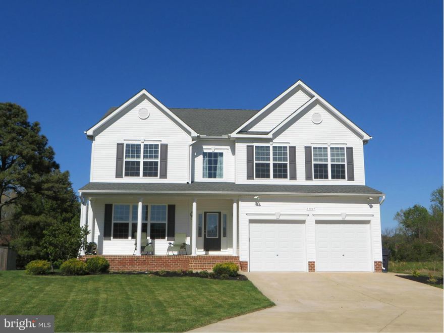 Big beautiful Belmont model w/2' extension, 9' ceilings all 3 levels, lots of light! Roomy KT w/attractive maple cabinets, granite counters, stainless appl's; DR & LR, 15x19 FR w/bumpout bay window. MBR w/extra windows, extended walk-in closets, superbath w/deluxe shower, jetted tub. Bsmnt offers theater, rec space, bath, storage rm, & potential 5th BR. 1/2 AC lot, generator, alarm, larger garage!