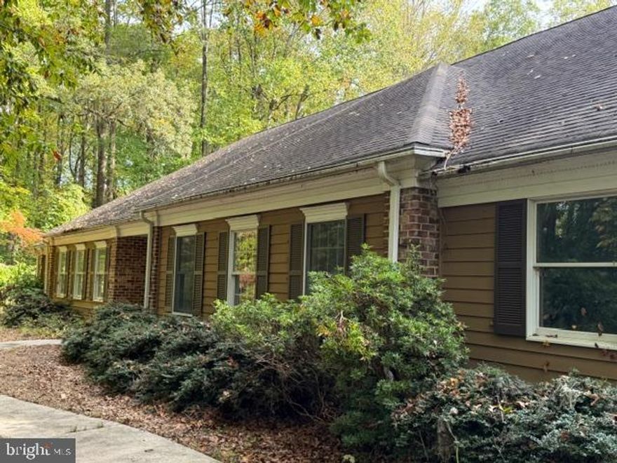 New Home Owners, Investors, Developers, Discover the perfect canvas for your dream home in this charming Colonial-style residence, built in 1987 and brimming with potential. Nestled in a serene setting, of over 20 acres, this detached gem offers a unique opportunity to create a personalized sanctuary, for you or your family, tailored to your lifestyle or the possibility of a subdivision with up to 15 single family lots. The existing home has a spacious layout and a solid foundation along with aluminum siding and brick, this home is ready for your creative touch and updating, boasting two main level main suites, a third bedroom, two full baths and two half baths.  The second level has attic spaces, two bedrooms and one bathroom. The generous three-car attached garage and ample driveway parking for ten vehicles ensure convenience for you and your guests. The property boasts a blank slate, in need of updates and possible expansion on the second floor, allowing you to design your ideal living environment. Whether you envision a modern kitchen, a tranquil outdoor retreat, or a vibrant entertainment area, the possibilities are endless. The Colonial architecture provides a classic charm that can be enhanced with your personal style. Located in a peaceful area this home offers the perfect balance of privacy and accessibility. Enjoy the tranquility of your surroundings while being just a short drive away from local amenities and attractions such as, parks and recreation areas, restaurants, shopping and the Chesapeake Bay. Seize this opportunity to invest in a property that invites your imagination and creativity. Your dream home awaits-let your vision come to life in this delightful Colonial residence!