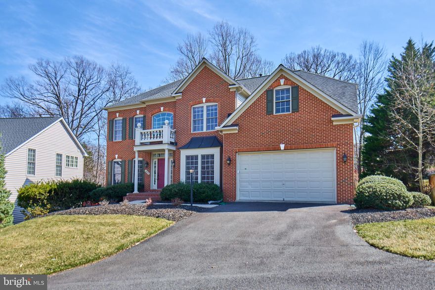 AVAILABLE FOR IMMEDIATE MOVE IN!! Beautiful brick front, detached home located in a great location in Chantilly! As soon as you enter the home, you will be drawn in by the soaring, 2 story foyer, gleaming hardwoods, architectural columns and moldings and an open floor plan. The main level offers a spacious, light filled formal living and dining rooms, office with built-in storage, a butler's pantry and a gorgeous family room with a 2 story ceiling and gas fireplace.  The large gourmet kitchen is equipped with lots of cabinets and counter top space and comes with granite counter tops, stainless steel appliances and a very large island! The walk in pantry offers more storage space. Enjoy the views from the many windows in the kitchen with space for a breakfast table. Easy access to the deck from the kitchen and the family rooms. The view from the deck is just amazing! Over looking a tree preserve area, enjoy the stunning views, shade from the tall trees, seasonal color and the chirping of birds all from the comfort of the spacious deck! The upper level has 4 generous sized bedrooms with 3 full baths, walk in closets and room to spread out. The primary bathroom comes equipped with a soak tub, stand-in shower, dual vanities and walk in closet. The basement rec room has high ceilings, lots of windows, a 4th full bathroom and access to the patio and the gorgeous backyard! The home is located in a serene neighborhood and yet is within minutes to the major commutes and the Westfields shopping area with Wegmans, popular restaurants and bars and Fair Oaks mall is only minutes away. More retail and shopping areas can be found off Rt 50. The school district is highly regarded! This home is available for immediate move-in. Come see it today!!