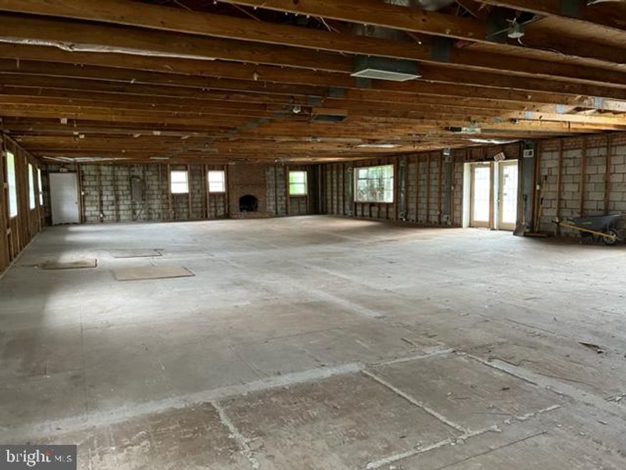 Huge property with 6216sf, 2-story, multi-unit building, large traffic count on major thoroughfare, Central Ave, walkable to Addison Road-Seat Pleasant METRO  - *OWNER FINANCING AVAILABLE* - Zoned RMF-20 for high-density multifamily residential development, however suitable for former use as a medical building or other commercial/retail businesses. Currently gutted, the building is largely a shell and to be sold as-is. THIS SALE INCLUDED BOTH THE FRONT PARCEL WITH THE BUILDING AND THE REAR PARCEL, A LARGE GRAVEL LOT. This front parcel's land totals 10,534 sf.  Please refer to the listing photo of the survey to view boundary lines. The rear parcel,  including outbuildings and flat gravel lot, is for sale separately (64,975sf). Building uses include multi-unit development, day care, salon, church, restaurant, alcohol production, catering, convenience store, grocery bank, performance hall, contractors office, office, dwelling, private club/lodge, nonprofit, assisted living, antennas, broadcast, emergency services, farmers market, garden center, assisted living, school, doctor's office, medical, parking, vet, art, performance space, funeral home, business support services. The building has multiple entrances, a commercial garage door and multiple utility meters. The plumbing and HVAC conduits appear to remain in-place. Property has a 22' right of way off north side of Central Ave at lot entrance and sits between a church and day care center. Lots of opportunity here!