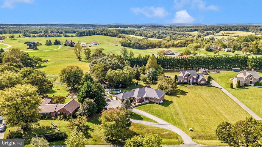 A rare land value opportunity in Montgomery County’s Agricultural Reserve—welcome to 21618 Slidell Road. Set on 1.5 acres of AR-zoned land, this property offers a unique chance to invest, expand, or custom build in one of the region’s most desirable locations. Whether you envision a new construction residence, small-scale farming, equestrian use, or a long-term investment, the potential here is extraordinary. The acreage provides privacy, space to reimagine, and the freedom to bring your vision to life. AR zoning supports a wide range of uses—from gardens, animals, or hobby farming to recreational retreats—all while enjoying close proximity to top-rated schools, cultural destinations, shopping, and major commuting routes. Eligible for USDA financing with 0% down, this property offers accessibility as well as opportunity. 

The existing two-level rancher offers immediate livability. Recent updates include a new roof (2025), updated HVAC thermostat, newer dishwasher and refrigerator, retractable awning, and an elevator for accessibility. Interior highlights include hardwood floors, a rustic stone fireplace, sunroom with panoramic views, a country kitchen with breakfast nook, and a finished walk-out lower level with additional bedrooms, baths, and living space. Outdoors, established infrastructure includes a deck, screened-in gazebo, patio with fire pit, storage sheds, and fruit-bearing trees. 

For all visionaries alike, 21618 Slidell Road is more than a home—it’s a rare AR-zoned acreage offering flexibility and the chance to create something extraordinary in Montgomery County.