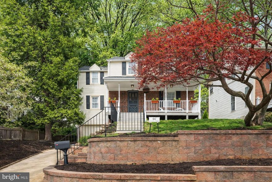 If you’ve been looking for a home that feels like a retreat but lives like a neighborhood, this is it. Tucked on a quiet cul-de-sac and surrounded by mature trees, gardens, and green space, this home feels like a peaceful retreat while still being close to everything.

This classic 1940s home blends timeless charm with thoughtful modern upgrades and offers four bedrooms, two full baths, and two half baths across multiple finished levels. Inside, you’ll find hardwood floors, warm and inviting living spaces, and updates throughout that make the home feel both classic and comfortable.

The updated kitchen features new countertops, appliances, lighting, and bar seating, and opens into bright living and dining spaces perfect for everyday living and entertaining. The main level also includes a bedroom with built-in bookcases and a heated sunroom that makes the perfect office, reading room, or cozy retreat.

Step outside and you’ll really understand what makes this home special. The shaded back patio and garden are designed for both beauty and function, with predominantly native and edible plants, pollinator gardens, and mature landscaping that provides greenery and privacy year-round. The usable yard space has been expanded with retaining walls and thoughtful landscaping designed to work with the natural setting.

The WALK-OUT basement provides flexible finished space for guests, work-from-home, hobbies, or additional living space, along with laundry and storage.

Beyond the property itself, the neighborhood is something truly special — known for its strong community, neighborhood events, gardens, parks, and access to Sligo Creek Trail. With easy access to transit and a convenient commute to DC, this home offers the rare combination of nature, community, and convenience.